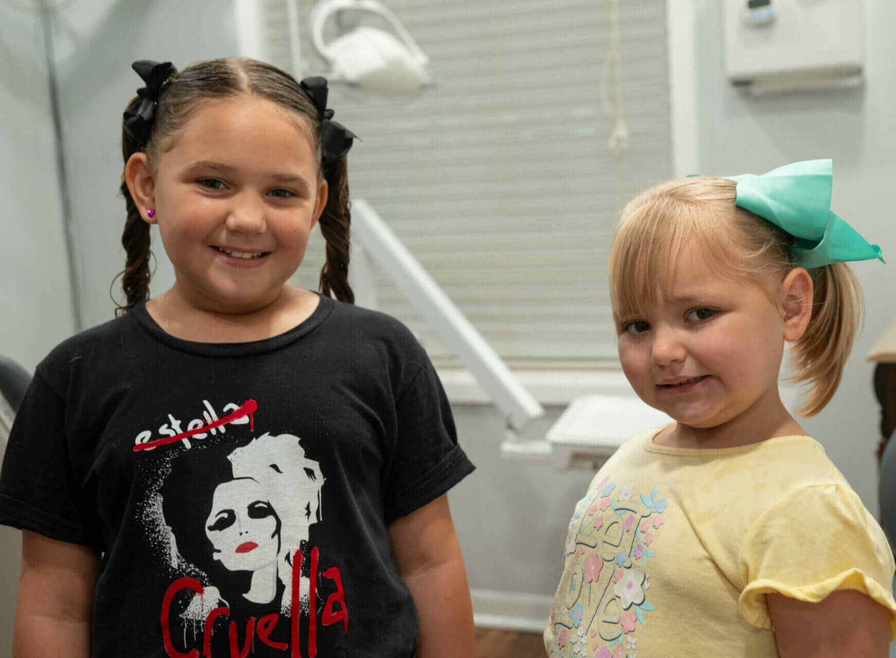 2 little girl patients smiling